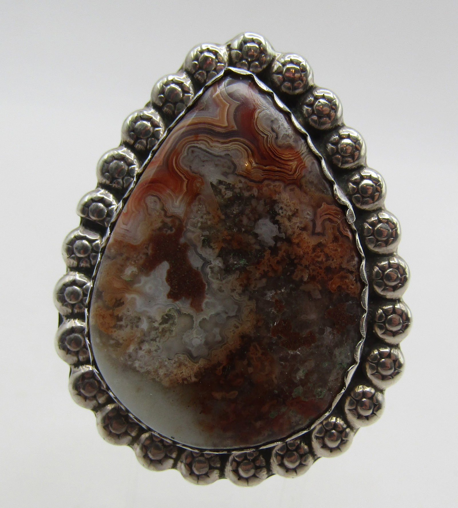 HUGE HERBERT TSOSIE AGATE RING STERLING SILVER: VINTAGE ESTATE ARTIST HALLMARKED "HT STERLING: HERBERT TSOSIE BLOOD STONE AGATE RING. NATIVE AMERICAN SOUTHWEST NAVAJO INDIAN JEWELRY. MEASURES 1.5 INCHES. TESTED STERLING SILVER. SIZE 8. WEIGHS 18.8 