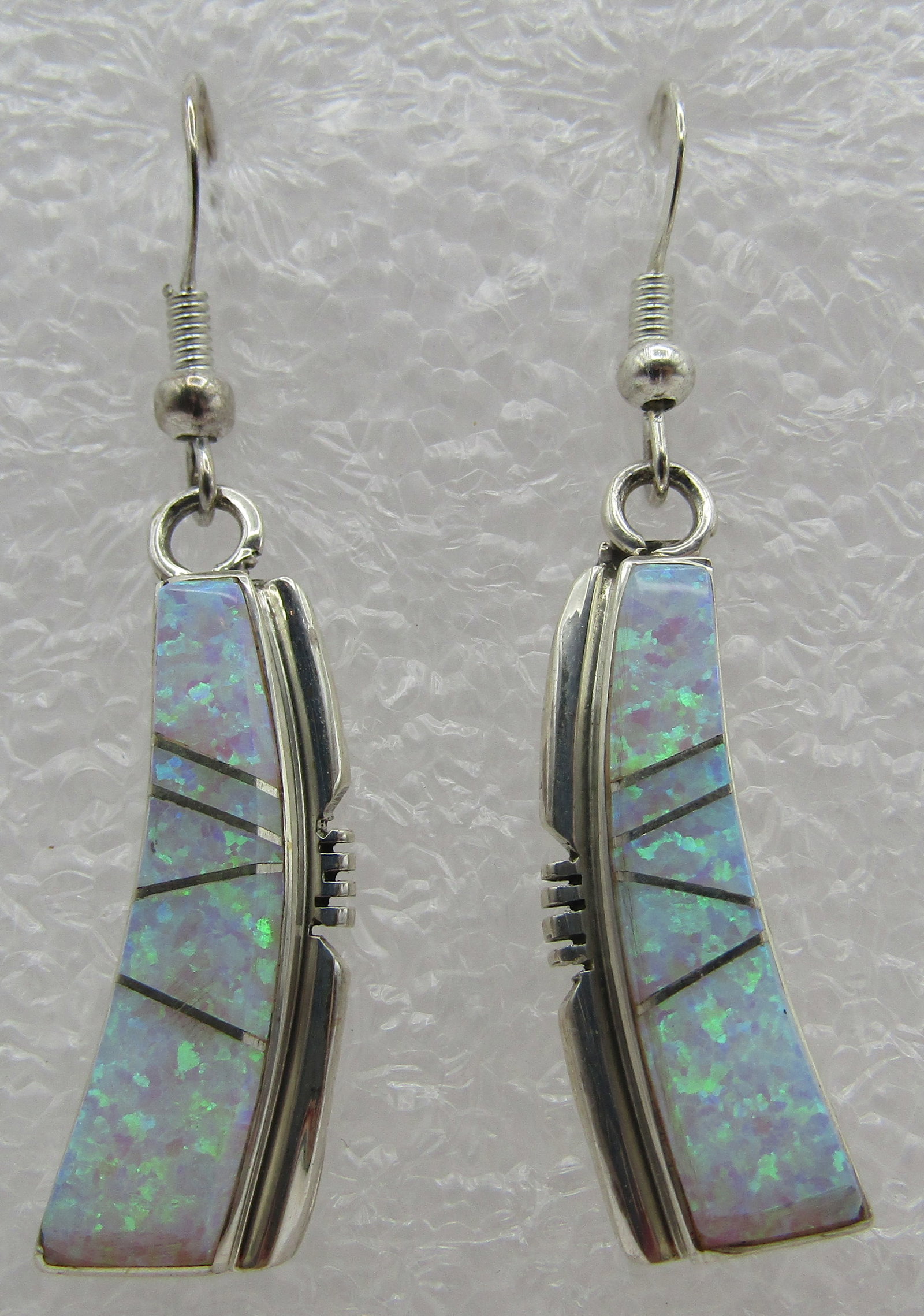 TOM SHIRLEY OPAL EARRINGS STERLING SILVER: UNSIGNED TOM SHIRLEY OPAL EARRINGS. NATIVE AMERICAN SOUTHWEST NAVAJO INDIAN JEWELRY. MEASURES 1.75 INCHES. WEIGHS 6.4 GRAMS. EXCELLENT CONDITION. WITH IMPERIAL AUCTION THE COST FOR PACKING AND SHIPPIN