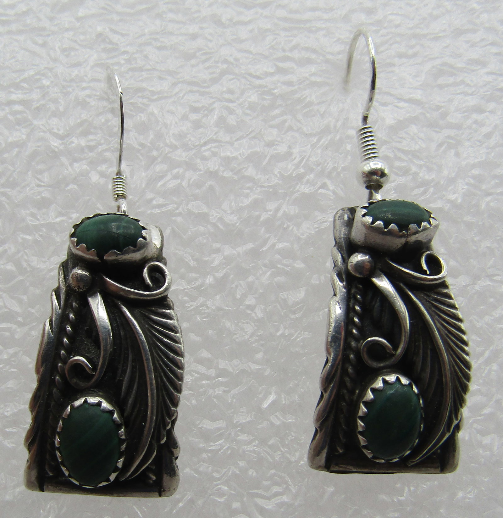 LH MALACHITE EARRINGS STERLING SILVER HANDMADE: ARTIST HALLMARKED "L H STERLING." NATIVE AMERICAN SOUTHWEST NAVAJO INDIAN JEWELRY. MEASURE 1.5 INCHES. WEIGH 8.0 GRAMS. EXCELLENT CONDITION. WITH IMPERIAL AUCTION THE COST FOR PACKING AND SHIPPING VIA