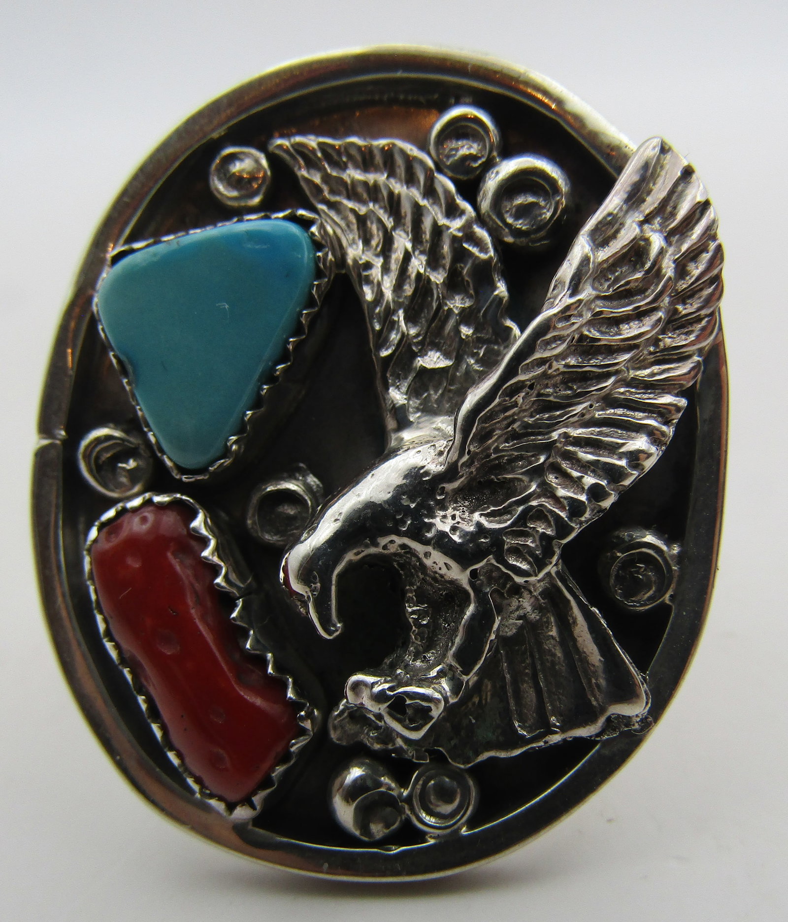 "RB" TURQUOISE CORAL RING STERLING SILVER SIZE12.5: VINTAGE ESTATE HUGE TURQUOISE, CORAL EAGLE RING. SIGNED "RB".TESTED STERLING NATIVE AMERICAN SOUTHWEST NAVAJO INDIAN JEWELRY. TOP MEASURES 1.5 INCHES BY 1 INCH. WEIGHS 19.0 GRAMS. SIZE 12.5. EXCELLENT