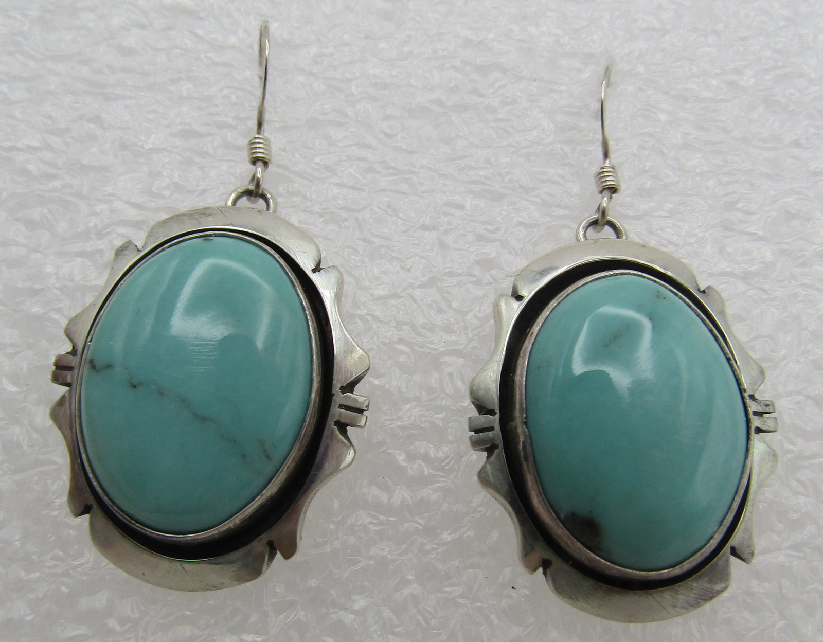 "ES" TURQUOISE EARRINGS STERLING SILVER: TURQUOISE STERLING SILVER EARRINGS ARTIST SIGNED "ES STERLING". HANDMADE NATIVE AMERICAN SOUTHWEST NAVAJO INDIAN JEWELRY. MEASURE 1.5" LONG. WEIGH 15.3 GRAMS. EXCELLENT CONDITION. WITH IMPERIAL AUCTIO