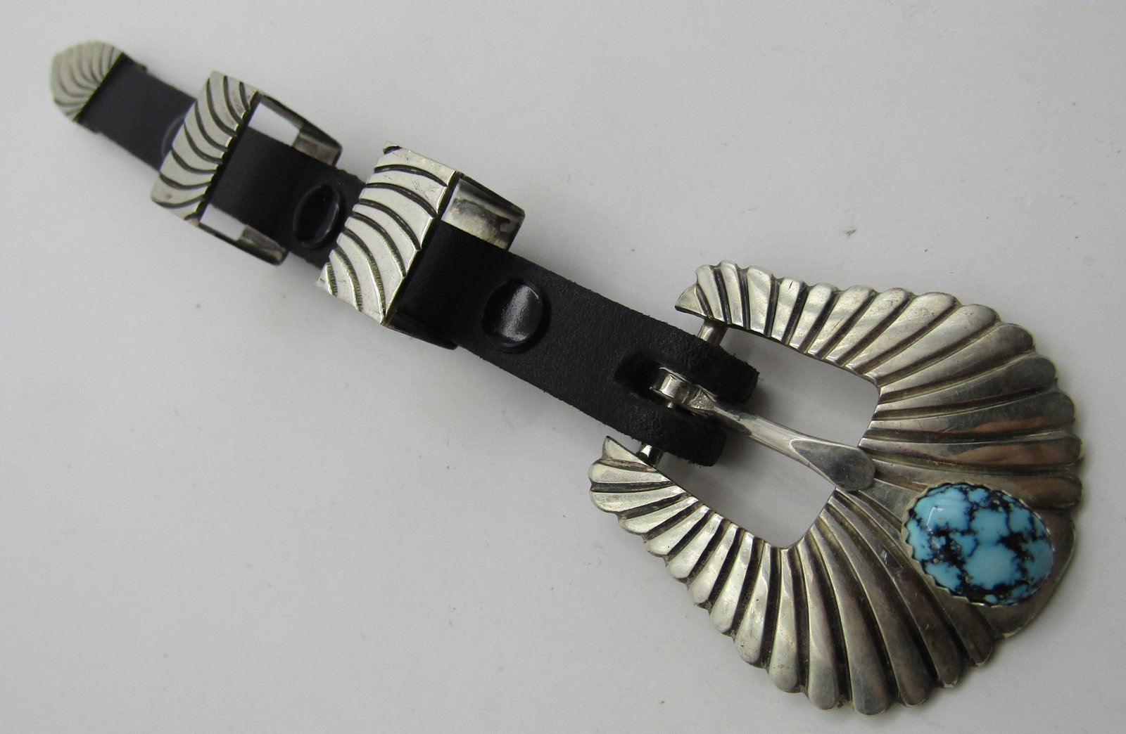 BEGAY TURQUOISE 4PC BELT BUCKLE STERLING SILVER: SPIDERWEB TURQUOISE 4 PIECE BUCKLE SET. ARTIST SIGNED "P BEGAY STERLING" NATIVE AMERICAN SOUTHWEST NAVAJO INDIAN JEWELRY. BUCKLE MEASURES 1 3/4 INCHES BY OVER 1 1/2 INCH. WEIGHS 42.0 GRAMS. EXCELLENT 