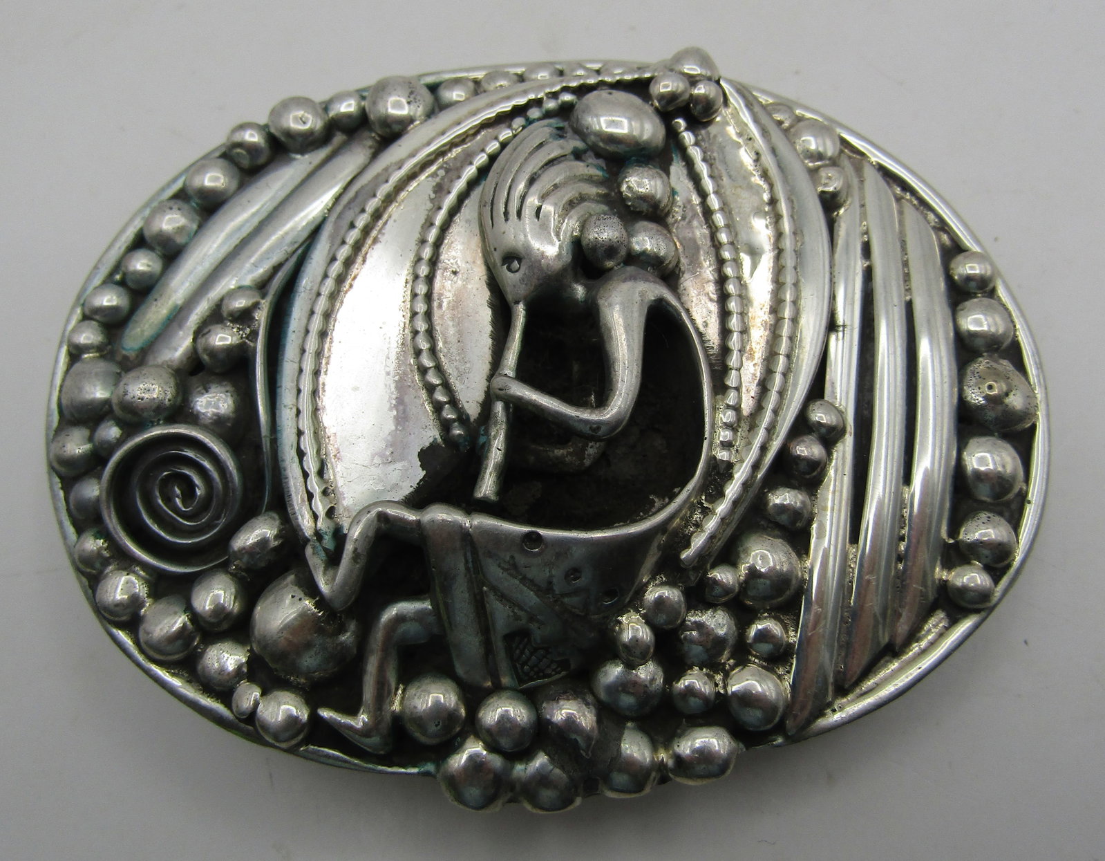 "FIERRO" BELT BUCKLE STERLING SILVER 115GRAM: VINTAGE ESTATE ARTIST HALLMARKED "E&C FIERRO STERLING" NATIVE AMERICAN SOUTHWEST NAVAJO INDIAN JEWELRY. MEASURES 3 3/8 INCHES WIDE. TESTED STERLING SILVER. WEIGHS 115.6GRAMS. EXCELLENT CONDITION. WITH