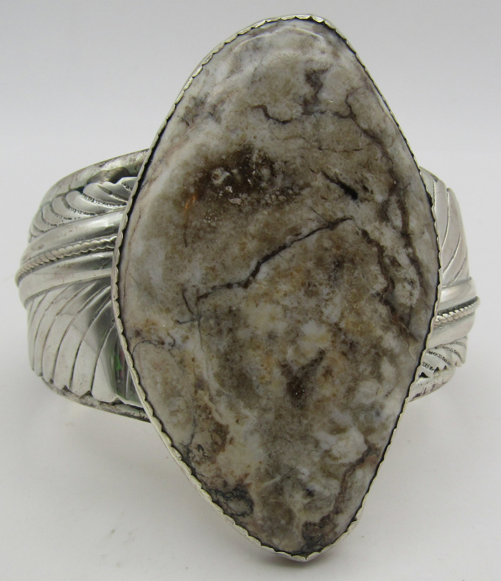 "R" WILD HORSE CUFF BRACELET STERLING 112.4GRAM: VINTAGE ESTATE ARTIST HALLMARKED "R STERLING" HUGE WILD HORSE BRACELET. NATIVE AMERICAN SOUTHWEST NAVAJO INDIAN JEWELRY. TOP MEASURES 3 INCHES WIDE. TESTED STERLING SILVER. FITS AN 8 INCH WRIST WITH A