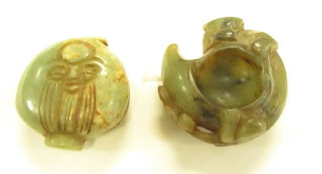 2 Jade Monkey Inkwell & Circular Figurine: 29.1. Both measure 2". One is of a monkey or demon holding a bowl, inkwell or inkpot that is shaped similar to half of a yin yang symbol (possibly signed). The other is of an elderly man with a carved