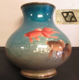 Hayashi Kodenji Cloisonne Goldfish Koi Vase: 34.12. This excellent example of 19th century Imperial Japan cloisonne has five orange and black fishes swimming in a blue to silver colored wireless cloisonne enamel vase. By Hayashi Kodenji. Measure