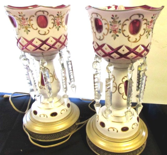 2 Czech Bohemian Mantle Luster Lamps Enamel: 3.447. CUT OVERLAY GOTHIC ARCH PAIR OF MANTLE LUSTERS, white to cranberry with polychrome-enamel floral and gilt decorations, each turret-top form with 8 prisms, raised on a tall stem and slightly