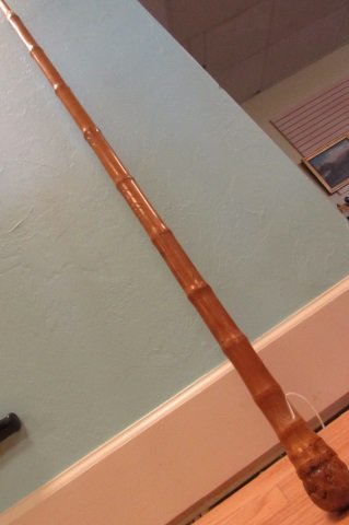Fishing Pole inside Bamboo Cane circa 1920s: 3.646. Cane turns into handle of fishing rod (4 total telescoping segments). Signed with Japanese characters. Unique and ornately carved. cane measures ~36". Total 92".