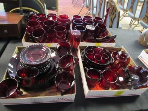 Ruby Red Glass Collection Cups Saucers Plates: 95.8. Total 74 pieces, shot glasses, drink glasses, wine glasses, tea cups, saucers, dinner plates, desert plates, decanter, serving plates, Some have Anchor Hocking mark on bottom. Some match, some d
