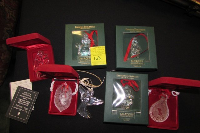 (7) Waterford Ornaments Crystal Christmas: 77.6. Lot contains Waterford Twas the Night before christmas, Silent night, angel trumpetting, Marquis Santa Caroler & snowman. One angel has no box. The other 6 has boxes.