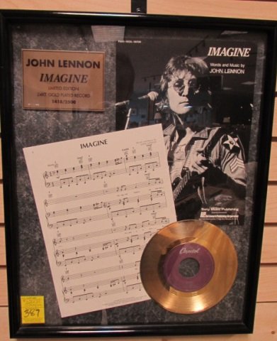 John Lennon Imagine 24k Gold 45 Photo Music Framed: 90.4 John Lennon Imagine Limited Edition 24k Gold Plated 45 with Photo and Music. Framed measures 20 1/2 inches by 17 inches.