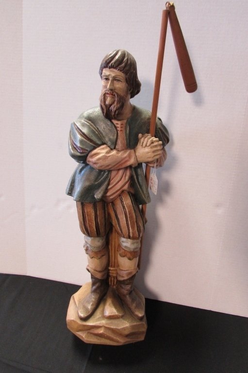 Shepherd Saint German Painted Wood Carving: 65.19c. After Erasmus Grasser Renaissance style sculpture. Superior Quality Antique German wood carving and painting. Measures 23" tall. Depicts a Christian or Catholic saint holding a pole.