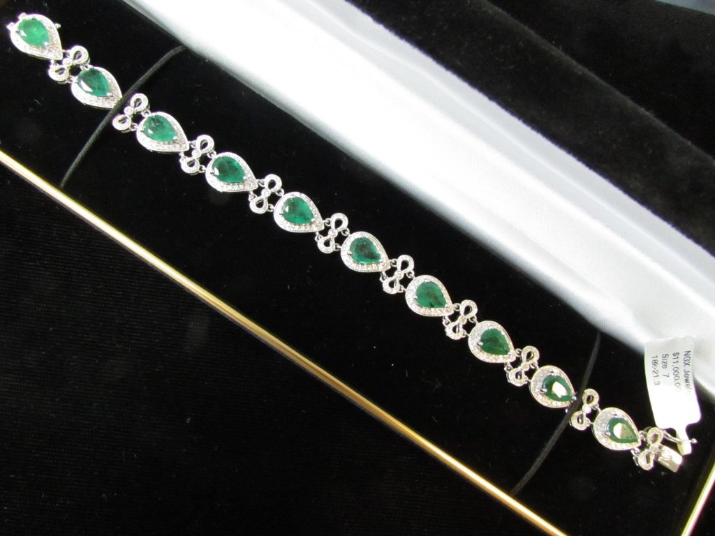 GLA Certified 9.7 ctw Emerald 18k Gold Bracelet: 127.2. BRAND NEW NEVER WORN. Solid 18k white gold bracelet has 9.7 ctw Genuine emeralds, 1.4 ctw SI-2 Diamonds. Measures 7" long, and weighs 19 grams. original tag included.