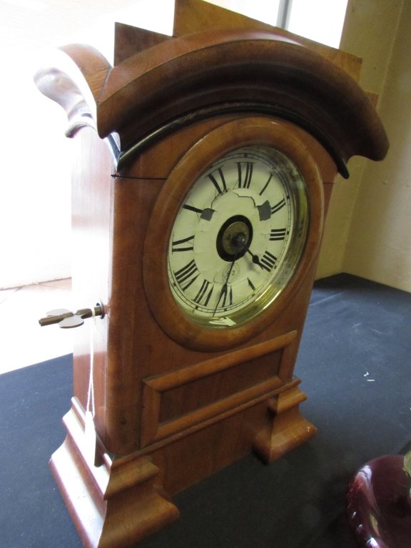 American Mantle Clock Antique Seth Thomas: 51.0. Antique Bedeimeier Style Case American Mantle Clock. Marked "ST" The case is 15 1/5" tall by 10 1/2" wide. Dial has losses.