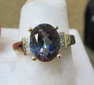 10K GOLD 8x10 MYSTIC TOPAZ 6 DIAMOND RING SZ 7-1/4: 2.0 10K GOLD 8mm BY 10mm MYSTIC TOPAZ & 6 DIAMOND RING SIZE 7-1/4 WEIGHS 3.2 GRAMS