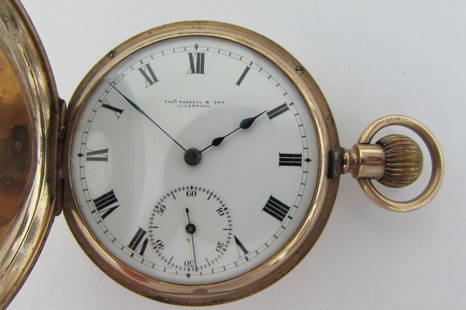 9k THOMAS RUSSELL & SON POCKET WATCH DEMI-HUNTER: 2.0 1875? THOMAS RUSSELL & SON YELLOW GOLD DEMI-HUNTER POCKET WATCH MARKED ".375", "9" And "T.R" WEIGHS 93.0 GRAMS MEASURES 50.0mm WITHOUT CROWN. I BELIEVE IT IS 16S RUNNING WELL