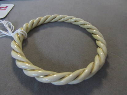 14k Solid Gold Ivory Rope Bangle Bracelet: 2.0. Opening measures 5.3 cm, 6 mm wide. DOES NOT FIT 7" WRIST