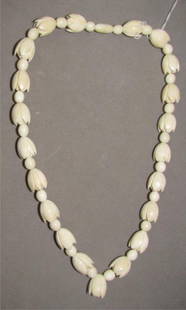 Carved Ivory Flower Bead Necklace: 2.0. Tulips or roses. Possibly by Ming. 18" long.