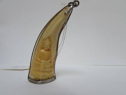 3" CARVED TIGER'S TOOTH IN SILVER FRAME PENDANT: 2.0 CARVED TIGER'S TOOTH IN SILVER FRAME PENDANT MEASURES 3" LONG AND WEIGHS 26.4 GRAMS