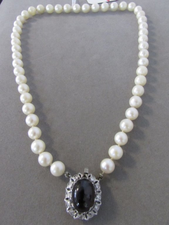 7.5MM PEARL 14K GOLD DIAMOND Garnet 17" NECKLACE: 2.0. ANTIQUE ALL GENUINE 7.5MM CULTURED PEARL NECKLACE. THE CATCH IS TESTED 14K WHITE GOLD IS MOUNTED WITH 11 DIAMONDS AND A HUGE 13MM BY 10MM CABACHON RUBY RED GARNET.