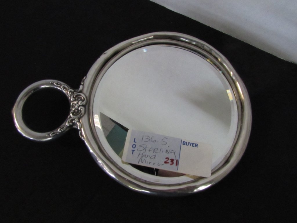 Sterling Silver Hand Mirror 7.5": 136.5. Monogrammed, repousse, weighs 290 grams.