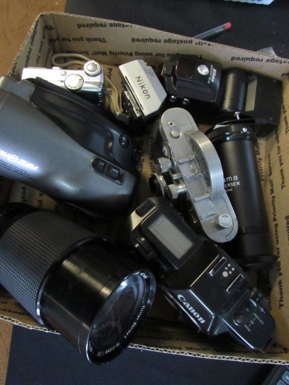 CAMERA LENSE CANON NIKON MERCURY VIVITAR: 2.0. ASSORTED CAMERAS & LENSES: CANON EOS630, MERCURY II, VIVITAR SERIES 1 70-120MM1:35, CANON PHOTURA ZOOM, CANON POWER SHOT A570IS, NIKON LENSE, NIKON FLASH, HAMA REVERSER.