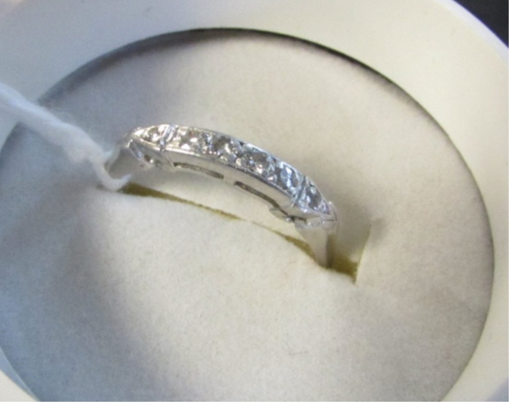 PLATINUM DIAMOND WEDDING BAND RING: 3.0. VINTAGE ESTATE GENUINE PLATINUM AND DIAMOND WEDDING BAND RING. 6 DIAMONDS .25 CARAT. SIZE 7 1/2.