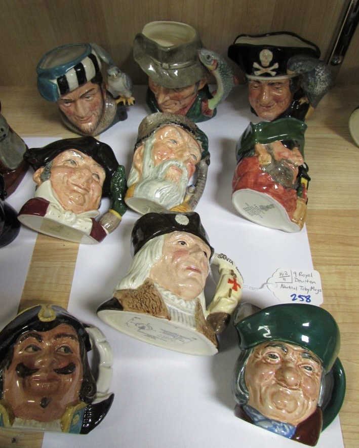 9 PC ROYAL DOULTON SMALL TOBY MUG JUG: 162.11. D5737 TOBY PHILPOTS; D6386 LONG JOHN SILVER; D6410 LIMITED ED, MINE POST; D6911 COLUMBUS; D6619 LTD SMUGGLER; D6464 POACHER; D6469 LTD CAPT HENRY MORGAN; D6539 ROINSON CRUSOE; D6540 FALCONER.