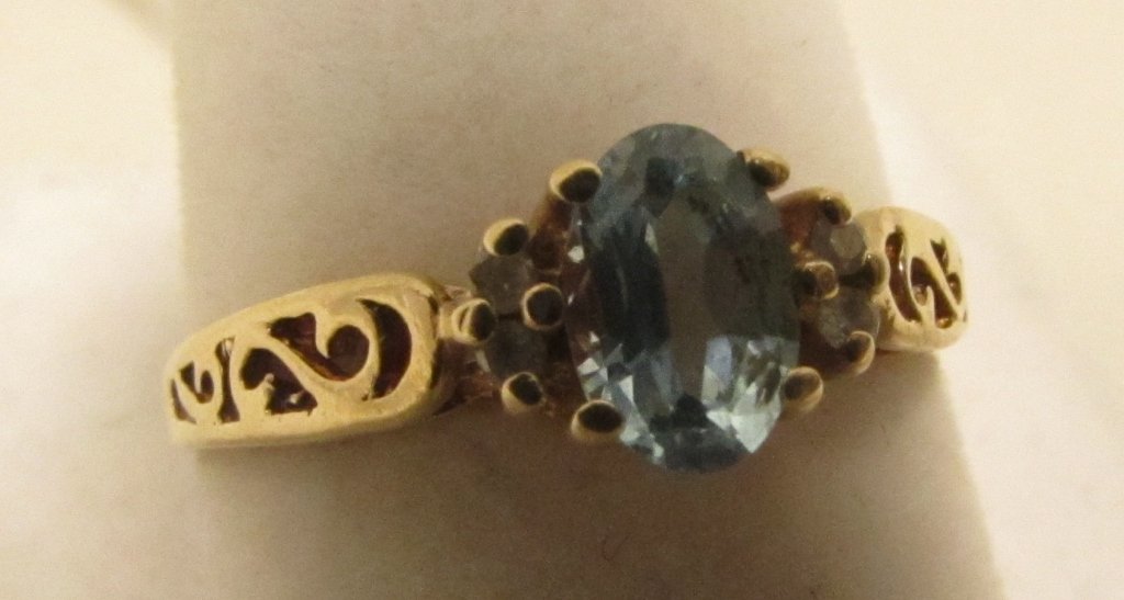 BLUE TOPAZ DIAMOND RING 14K GOLD SIZE 6 1/2: 3.0. ALL GENUINE OVAL BLUE TOPAZ ACCENTED WITH 4 DIAMONDS. MOUNTED FILIGREE 14K YELLOW GOLD