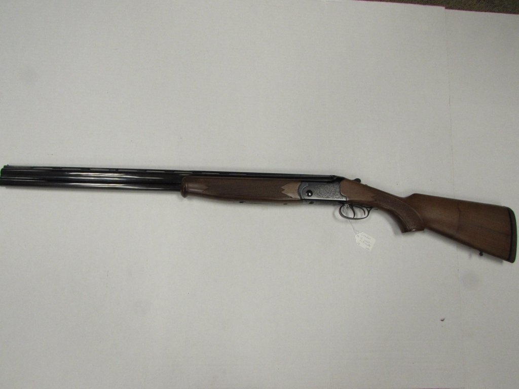 LANBER AUTOMATIC 12 GAUGE OVER UNDER: 2.0 LANBER AUTOMATIC 12 GAUGE OVER UNDER SHOTGUN. MADE IN SPAIN. 27.5" VENT RIB BARREL EXCELLENT CONDITION. SAFETY, WOOD STOCK, ETCHING.