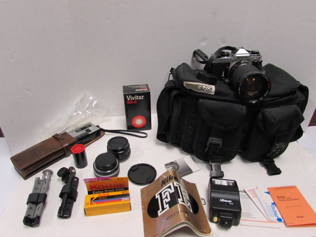 NIKON CAMERA w/ BAG & EQUIPMENT.: 2.0 NIKON CAMERA w/ BAG & EQUIPMENT. NIKON F3 3255646, w/ POCKET INSTAMATIC CAMERA, MULTIPLE LENSES. 2 TRIPODS, AC ADAPTER, LENS COVERS, FILM, MANUAL, & CPC CARRYING BAG.