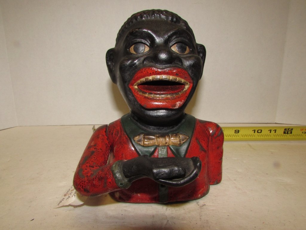 SHEPARD ''JOLLY NIGGER'' MECHANICAL CAST IRON BANK: 159.29 ANTIQUE (1882) SHEPARD HARDWARE ''JOLLY NIGGER'' MECHANICAL CAST IRON COIN BANK. (MECHANISM WORKS) (ORIGINAL, NOT RE-CAST) MEASURES 6.5" TALL x 5" WIDE
