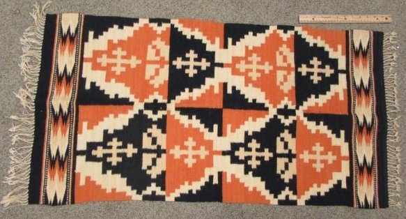 ANTIQUE NAVAJO HAND STITCHED RUG w/ CROSSES.: 3.0 NATIVE AMERICAN ORANGE BLACK WHITE w/ CROSSES. ORNATE DESIGN. THREE DIFFERENT COLORS MEASURES 41" x 21"