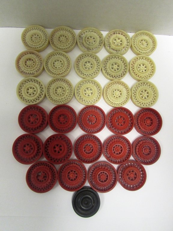 29 CHINESE EXPORT IVORY GAMING COUNTERS CANTON 1810: 159.72 29 CARVED IVORY CHECKER WHEEL PATTERN GAME PIECES WITH SMALL CARVED STARS. 1 BROKEN. EACH 1 1/4" DIA. NO SALES OF IVORY TO CALIFORNIA OR INTERNATIONAL.