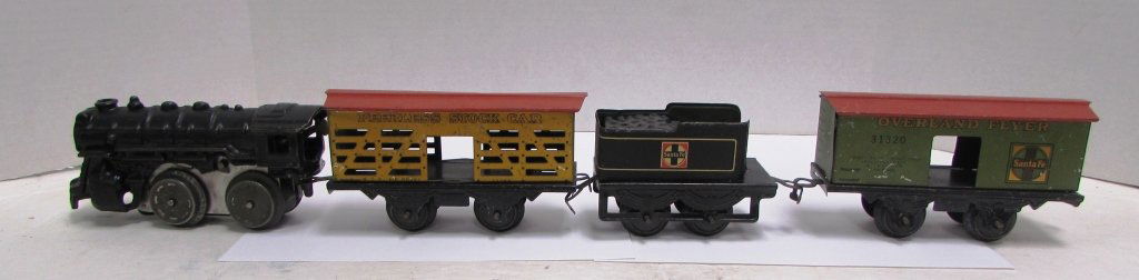 HAFNER TOY CLOCKWORK TIN TRAIN SET OVERLAND FLYER: 3.0 INCLUDES ENGINE, SANTA FE COAL CAR, PEERLESS STOCK CAR, SANTA FE OVERLAND FLYER PULLMAN