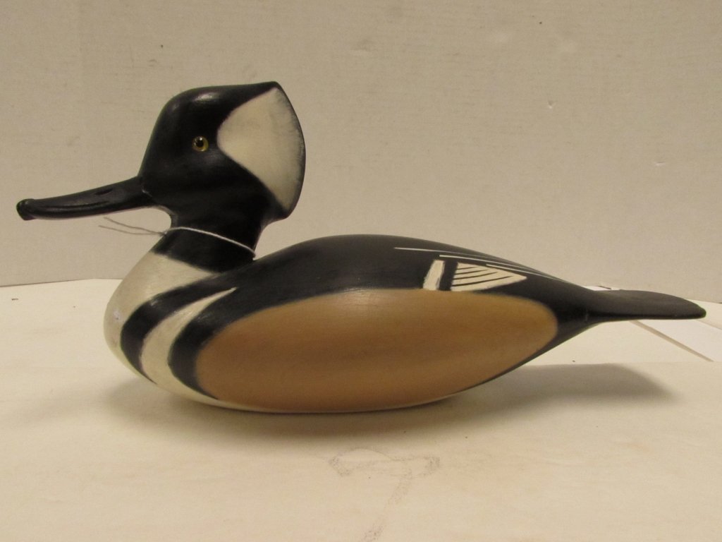 E J PETE PETERSON DUCK DECOY CARVED WOOD GLASS EYE: 204.2 DATED 1981 HAND CARVED & PAINTED DUCK DECOY BY E.J. PETE PETERSON. 11" LONG. GLASS EYES.