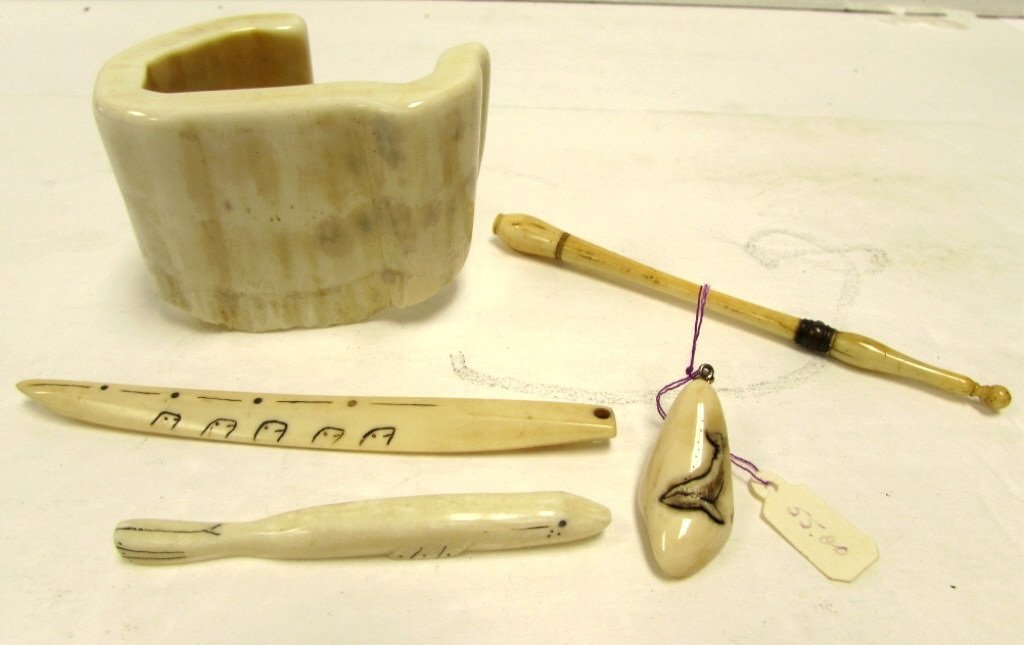5 CARVED IVORY SEWING CASE WALRUS JEWELRY PENDANT SIGN: 29.85 ALASKAN WHALE TOOTH PENDANT SIGNED 1.5" TALL. SEWING CASE NEEDLE HOLDER UNSCREWS AT BOTH ENDS 5" LONG. BANGLE 3" LONG x 2" TALL. SEAL FIGURE 3" LONG, SIGNED IVIY. LONG SEAL PENDANT 4.5" LONG SIG