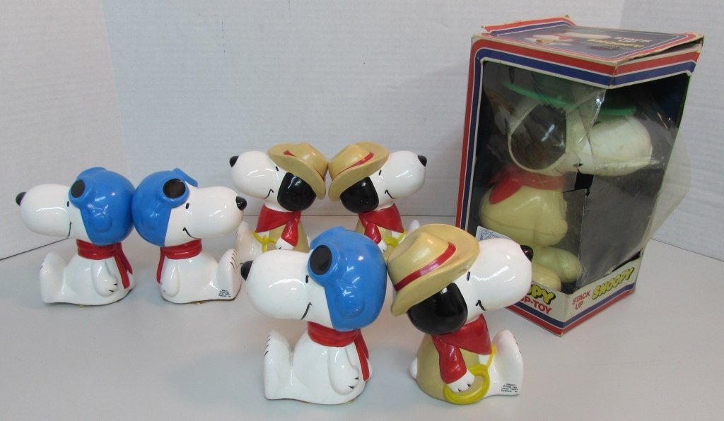3 SNOOPY BOOKEND SETS & STACK UP TOY: 205.16 3 SNOOPY BOOK END SETS AND 1 SNOOPY STACK UP TOY. AS FOUND, LOOK LIKE NEVER PLAYED WITH