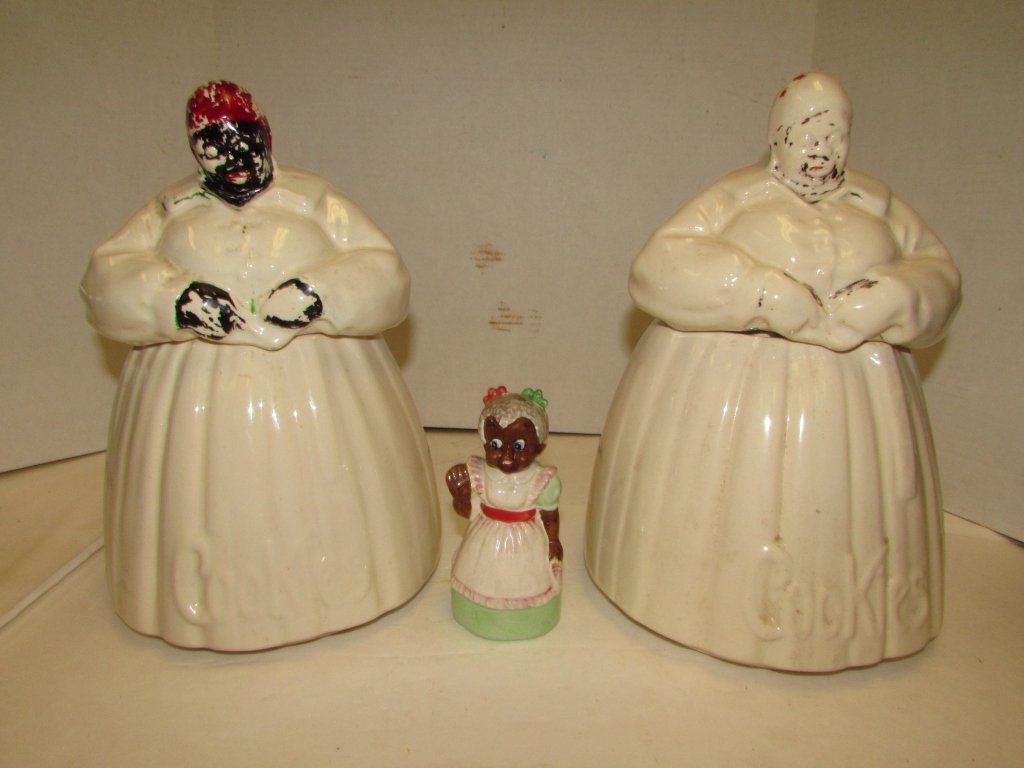 2 AUNT JEMIMA COOKIE JARS BLACK AMERICANA MCCOY: 212.30. TWO 11" TALL AUNT JEMIMA COOKIE JARS BY MCCOY - 1 BLACK AMERICANA SALT SHAKER - 5" TALL.