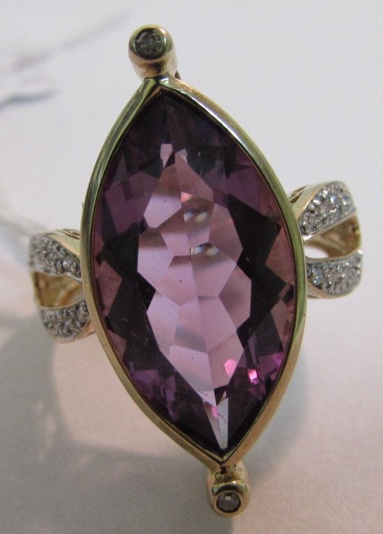 12 CARAT AMETHYST & DIAMOND RING 10K YELLOW GOLD: 3.748 SIZE 8. AMETHYST STONE MEASURES 20MM X 10MM