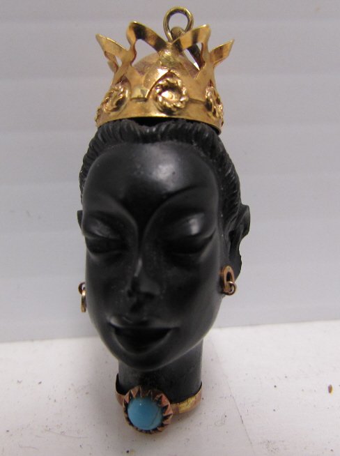 BLACKAMOOR EBONY PENDANT 18K GOLD TURQUOISE: TURQUOISE, CARVED EBONY & 18KT YELLOW GOLD ROYAL BLACKAMOOR PENDANT. 1.5" TALL x 1.75" WIDE.