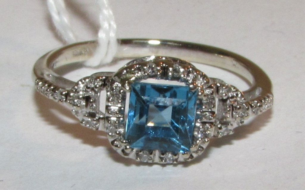 .75CT BLUE TOPAZ & DIAMOND RING 10K WHITE GOLD: SIZE 7. BLUE TOPAZ 5MM X 5MM WITH 20 DIAMONDS.