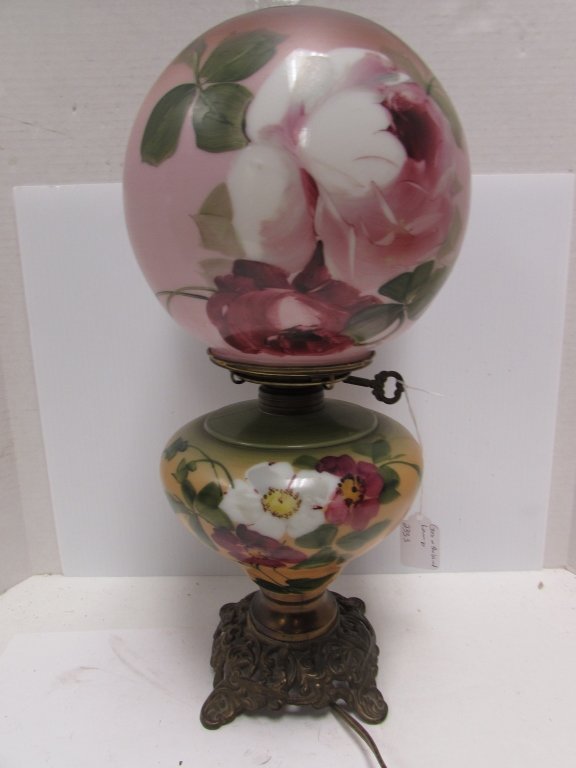 GONE WITH THE WIND OIL LAMP ELECTRIC PAINTED: 223.3 OIL STYLE LAMP ELECTRIED. PAINTED GLASS. GONE WITH THE WIND STYLE. 16.5" TALL x 7" WIDE.