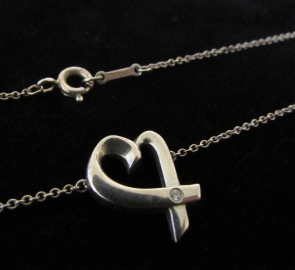 TIFFANY & CO PALOMA PICASSO HEART NECKLACE: DIAMOND & STERLING SILVER CHARM PENDANT IS 1/2". CHAIN MEASURES 16"