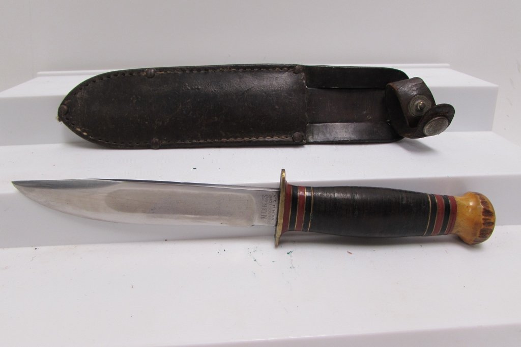 MARBLES IDEAL KNIFE STAG POMMEL LEATHER SHEATH: 249.31 PRE-WAR MARBLES KNIFE. 5" CLIP POINT BLADE, 10" OVERALL. STAG POMMEL, LEATHER HANDLE, LEATHER SHEATH.