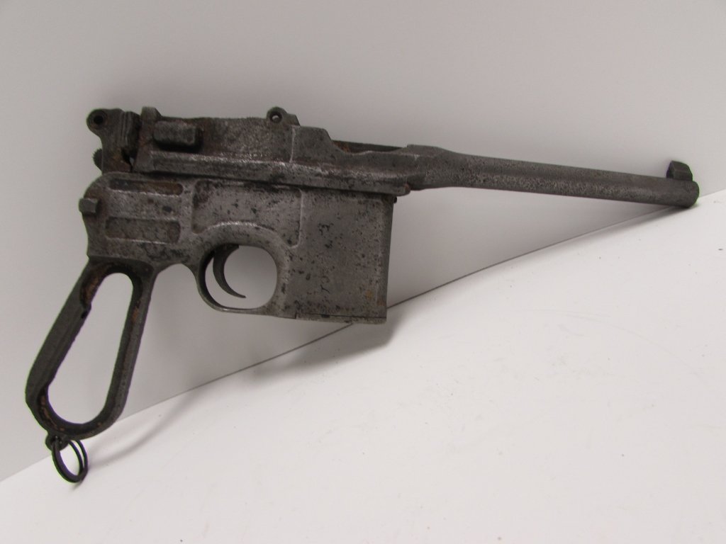MAUSER BROOMHANDLE PISTOL 30 CALIBER (DAMAGED): MAUSER BROOM HANDLE HAND GUN (GUN NOT IN WORKING CONDITION, DAMAGED IN ORIGINAL FACTORY WHICH WAS BOMBED AND BURNED).