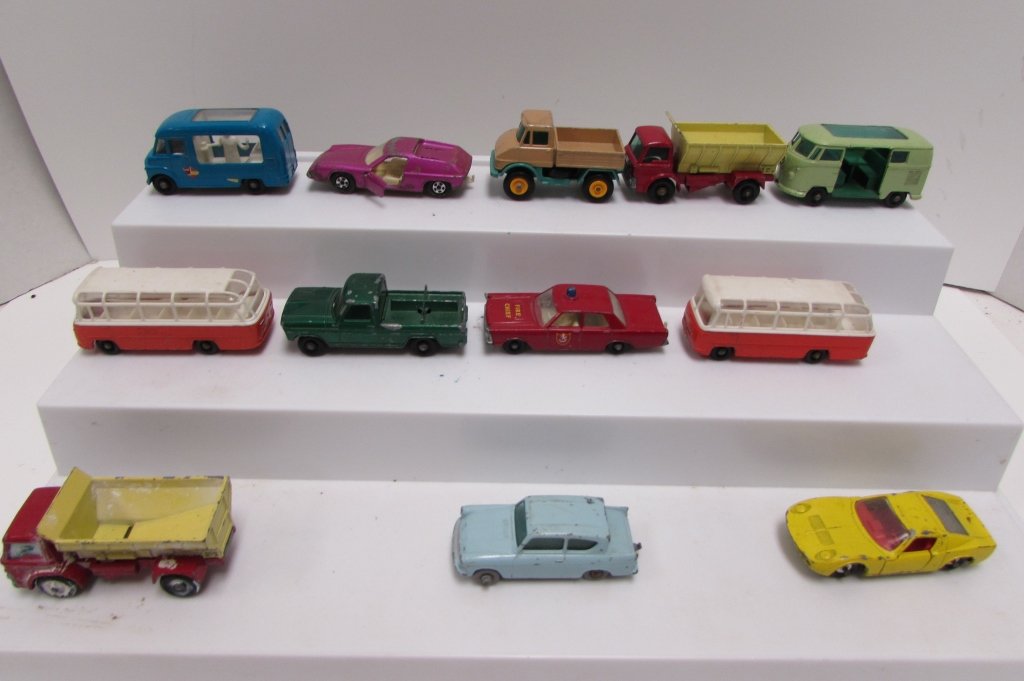12 TOY CARS MATCHBOX LESNEY VEHICLES DIE CAST: 12 PCS, #5 LOTUS EUROPA, #7 FORD ANGLIA, #33 LAMBORGHINI MIURA, #34 VOLKSWAGON CARAVETTE, #47 ICE CREAM CANTEEN, #49 UNIMOG, #50 KENNEL TRUCK, #55 59 FORD GALAXIE, #68 - MERCEDES COACH (2), #70 GRIT-S