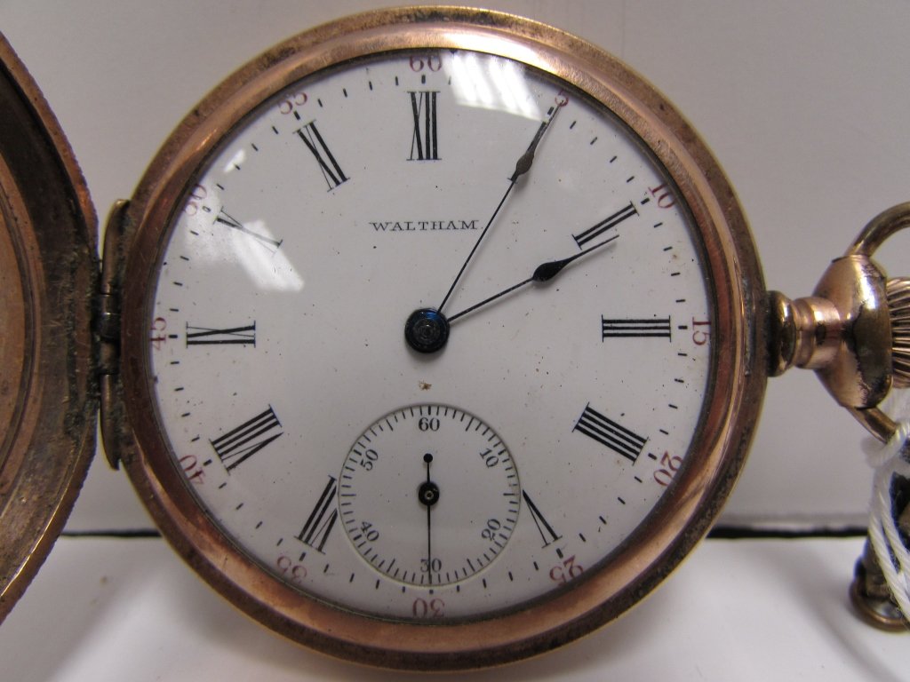 WALTHAM POCKET WATCH & ALBERT CHAIN AWW 18 SIZE: A.W.W. CO. WALTHAM POCKET WATCH. WARRANTED WADSWORTH 25 YEARS, HAND WIND MOVEMENT, 15 JEWELS, SAFETY BARREL, HUNTING CASE, CHAIN MARKED "SILVER FRONT" (752731).