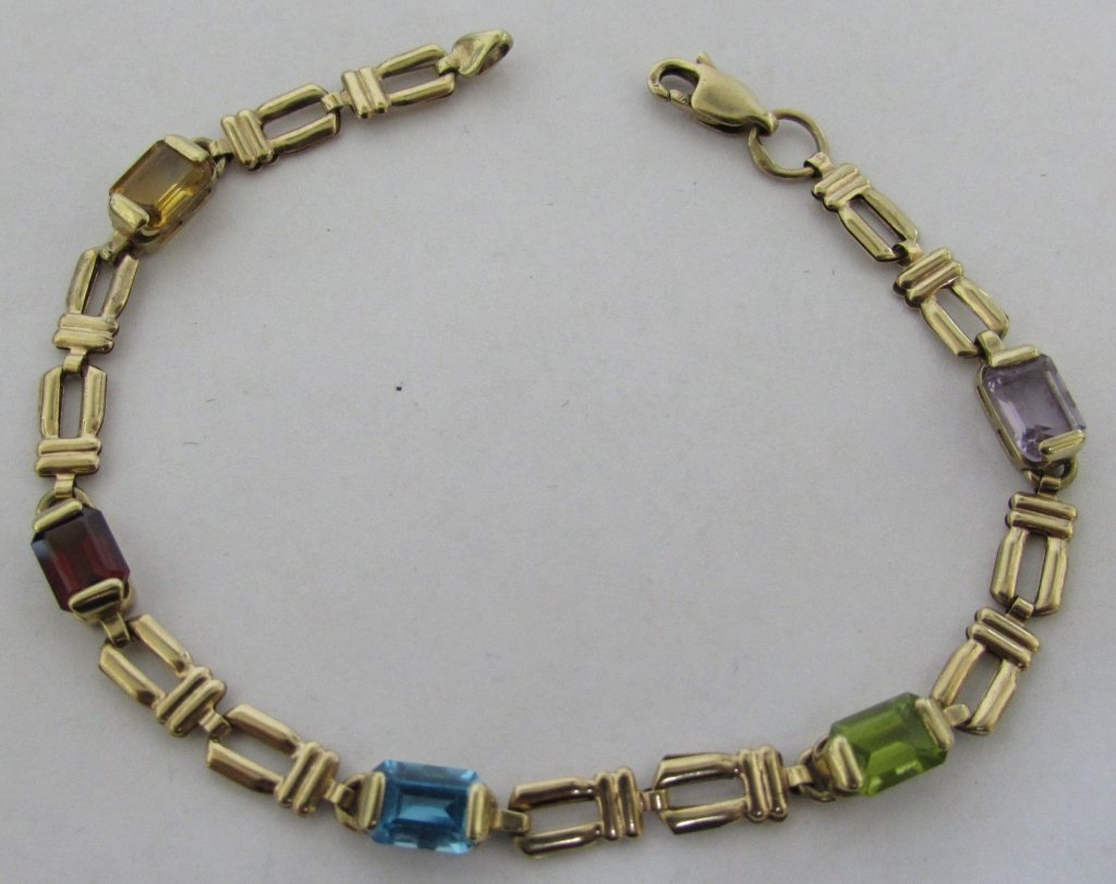 MULTI COLORED STONE BRACELET 10K GOLD: 136.82 MEASURES 7" LONG