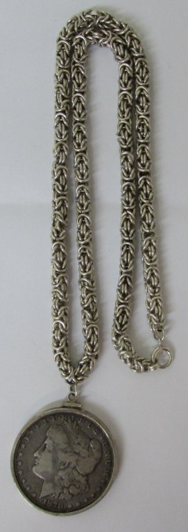 STERLING BYZANTINE CHAIN MORGAN SILVER DOLLAR 114G: 22" LONG WITH 1878 MORGAN US SILVER DOLLAR WITH TAIL FEATHERS. WEIGHS 114.9 GRAMS